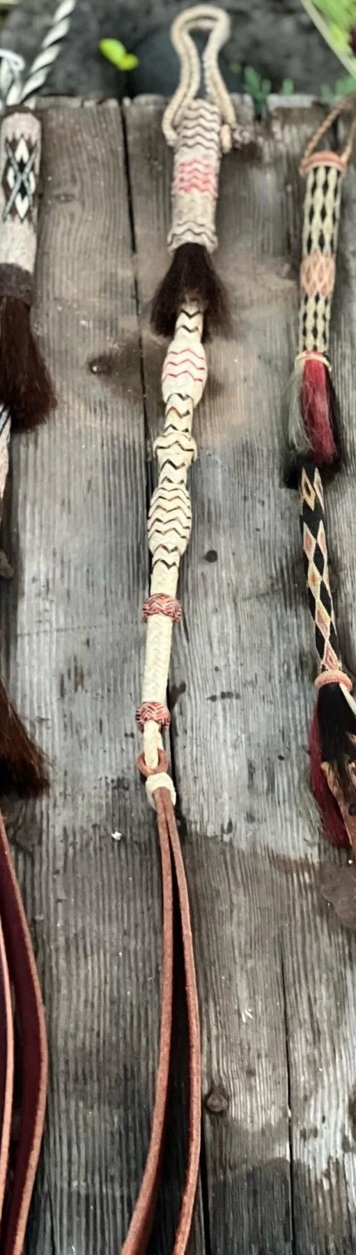 Braided rawhide quirt by Ismael Renteria