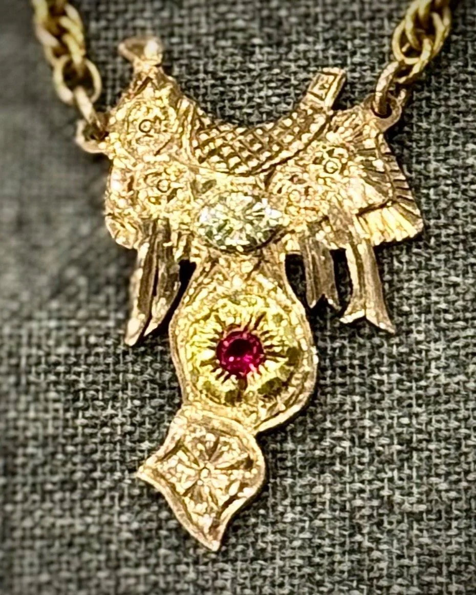 **1940s Solid 18K gold saddle tie bar by GRAVES MALONE of El Paso, Texas**

Available here: https://theoldspanishtrading.com/pins-fobs/graves-malone 

Here is one of the rarest items around.....a solid 18K gold and ruby TIE BAR featuring a WESTERN SA