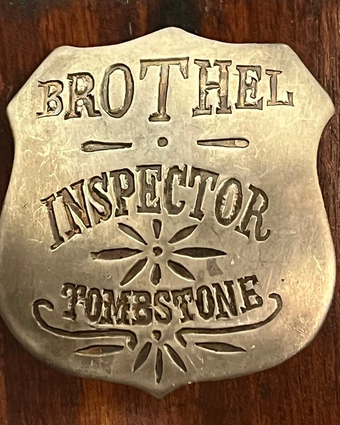 *Antique BROTHEL INSPECTOR badge from Tombstone, Arizona*
Available for purchase here: https://theoldspanishtrading.com/pins-fobs/brothel-badge 

Here is a neat OLD silver badge from the Brothel Inspector of Tombstone, Arizona. I don&rsquo;t know the