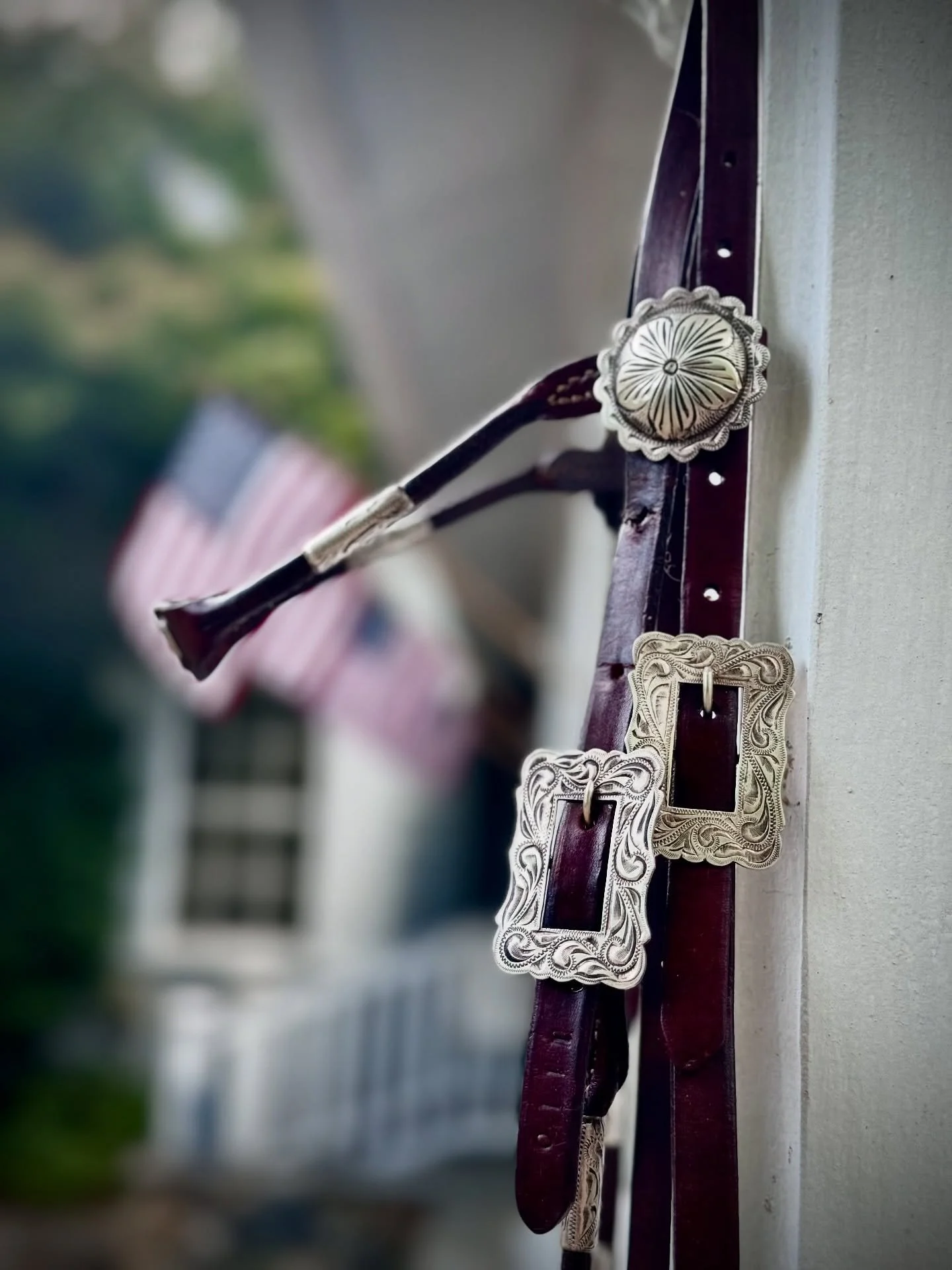 Vintage California Poco headstall with 10 solid sterling ferrules, two large 1.5&rdquo; sterling silver browband conchos, large sterling engraved brow panel, three sterling silver picture frame buckles, and two sterling conchos on the bit ends. Rolle