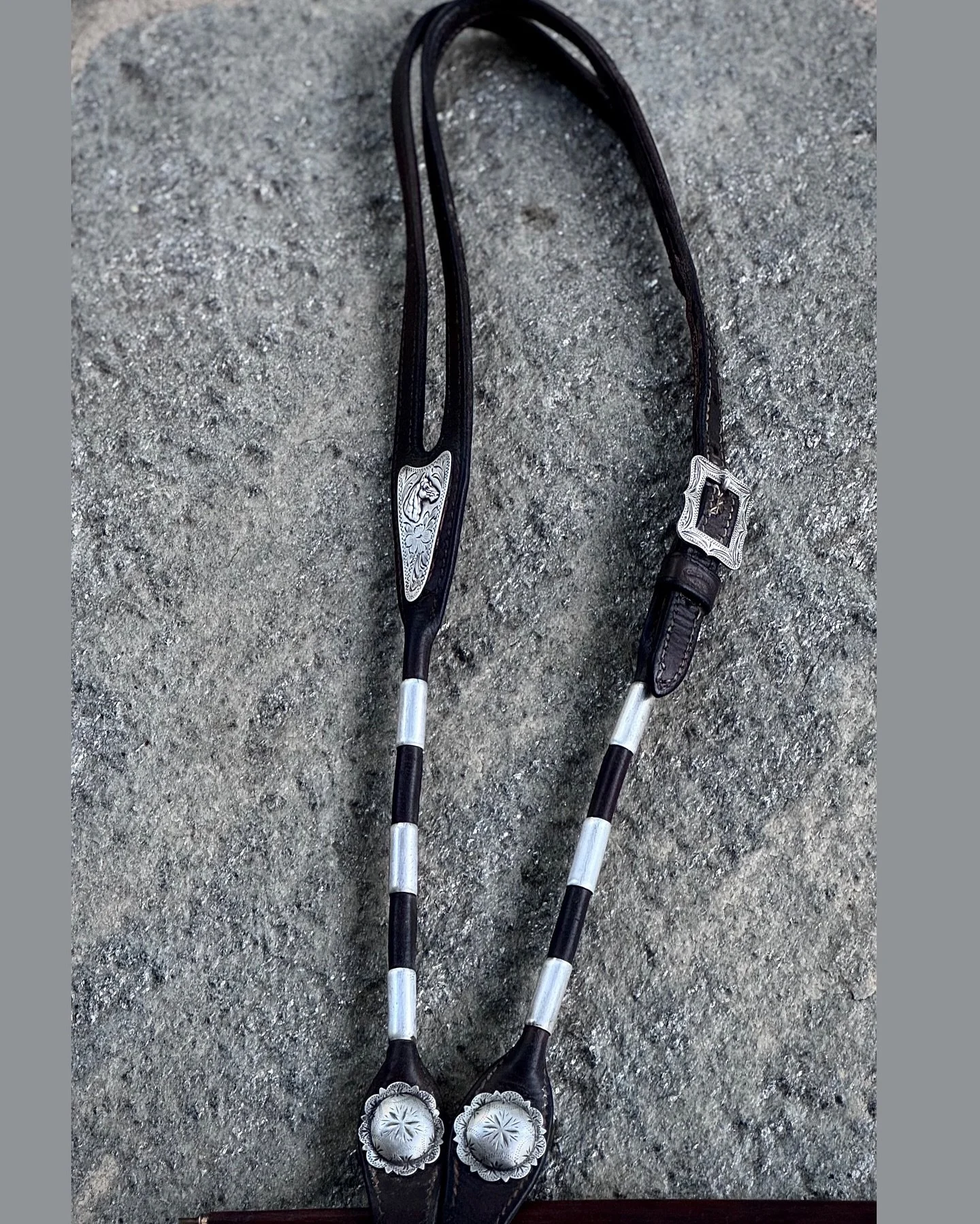 **Vintage Olsen Nolte Single Ear Poco Headstall Bridle w/Sterling Conchos**

Available for purchase here: https://theoldspanishtrading.com/rawhide-and-leather/olsen-nolte-headstall
Vintage, San Francisco, California made poco headstall. All sterling 