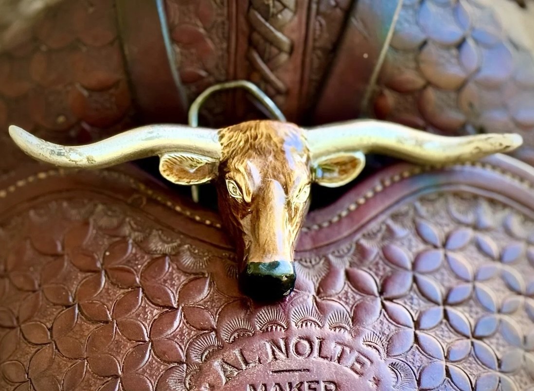 1940s Longhorn steer buckle

Available here: https://theoldspanishtrading.com/silver-buckles-and-conchos/ihmf4n1ob1ba22m7rmskxw8bh4uav7

Beautiful Texas Longhorn steer head buckle made circa 1940s. In perfect shape!  Buckle measures approximately 4.5
