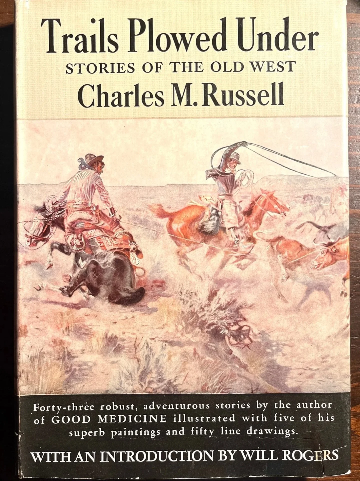 Trails Plowed Under by C.M. Russell 1927 1stEd Printing
Available for purchase here: https://theoldspanishtrading.com/books/sshy1iymumortur6va3u71tmkiotp4

Garden City: Doubleday, Doran &amp; Company, Inc., 1927 Sand-textured, brown cloth boards, wor