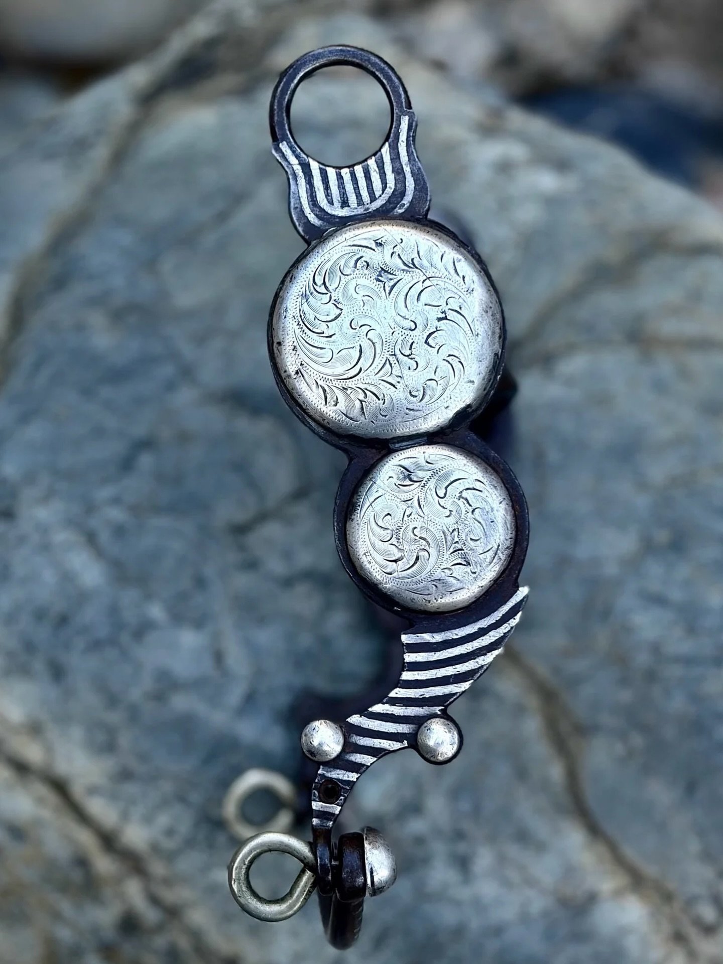 *RARE* Vintage Felix Guitron Concho Bit w/ Rutledge Mouthpiece
Here is a rare opportunity to own a bit with some incredible history from one of the most important reined cowhorse dynasties. This silver concho bridle bit by the late Felix Guitron Sr. 