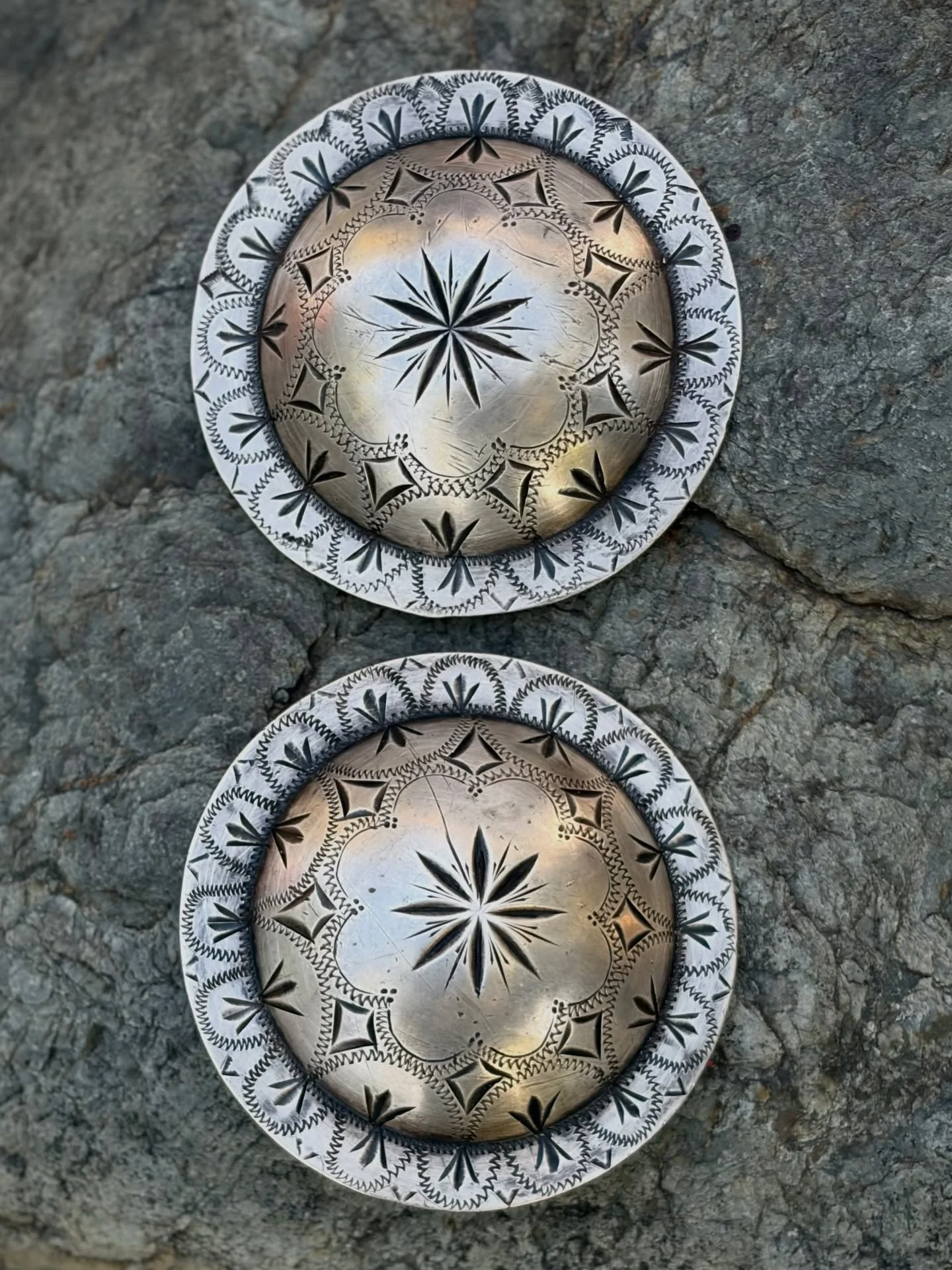 ✨ HUGE 3 1/2&rdquo; Antique Sterling Silver Visalia Pattern Engraved Conchos ✨
Available for purchase here: https://theoldspanishtrading.com/silver-buckles-and-conchos/xlarge-silver-conchos-7ptyx 

A fantastic pair of extra large, solid sterling silv