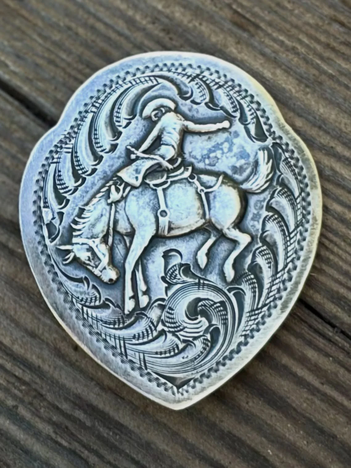 ✨ 1940s Vintage Cowboy on Bucking Bronc Sterling Silver pin ✨
Available here: https://theoldspanishtrading.com/pins-fobs/broncpin 

Beautiful bucking bronc and cowboy hat pin / brooch pin.  Made circa 1940s.  The pin is in the shape of an Indian arro