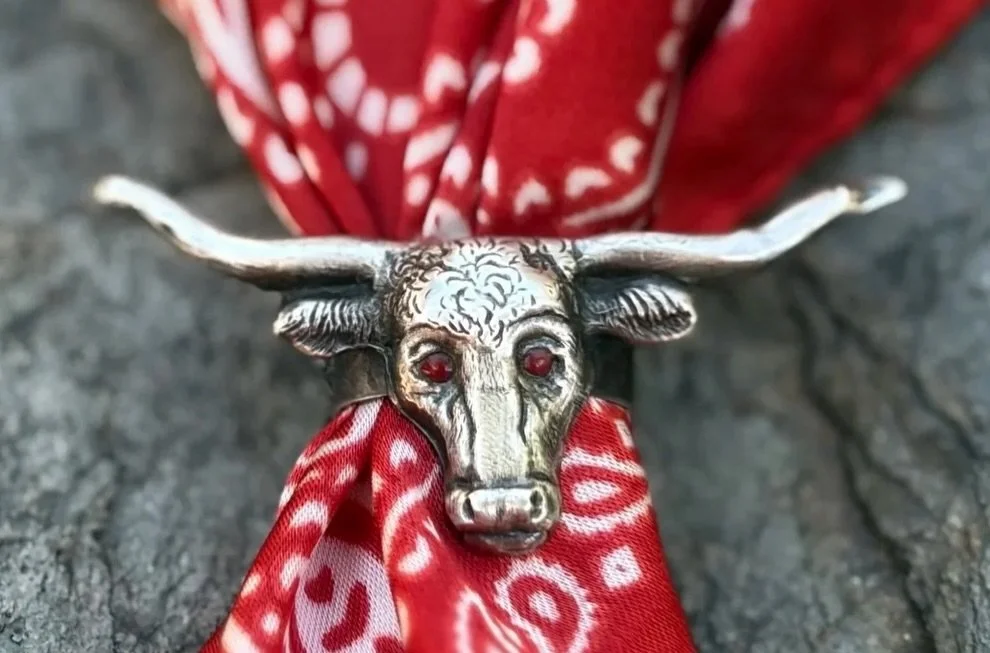 ❤️ Antique Sterling Silver Longhorn Steer Scarf Slide with ruby eyes ❤️
Available here: https://theoldspanishtrading.com/pins-fobs/longhorn-slide 

Antique Sterling Silver Texas Longhorn Steer Scarf Slide with ruby eyes.  Measures 2 1/2&rdquo; wide b