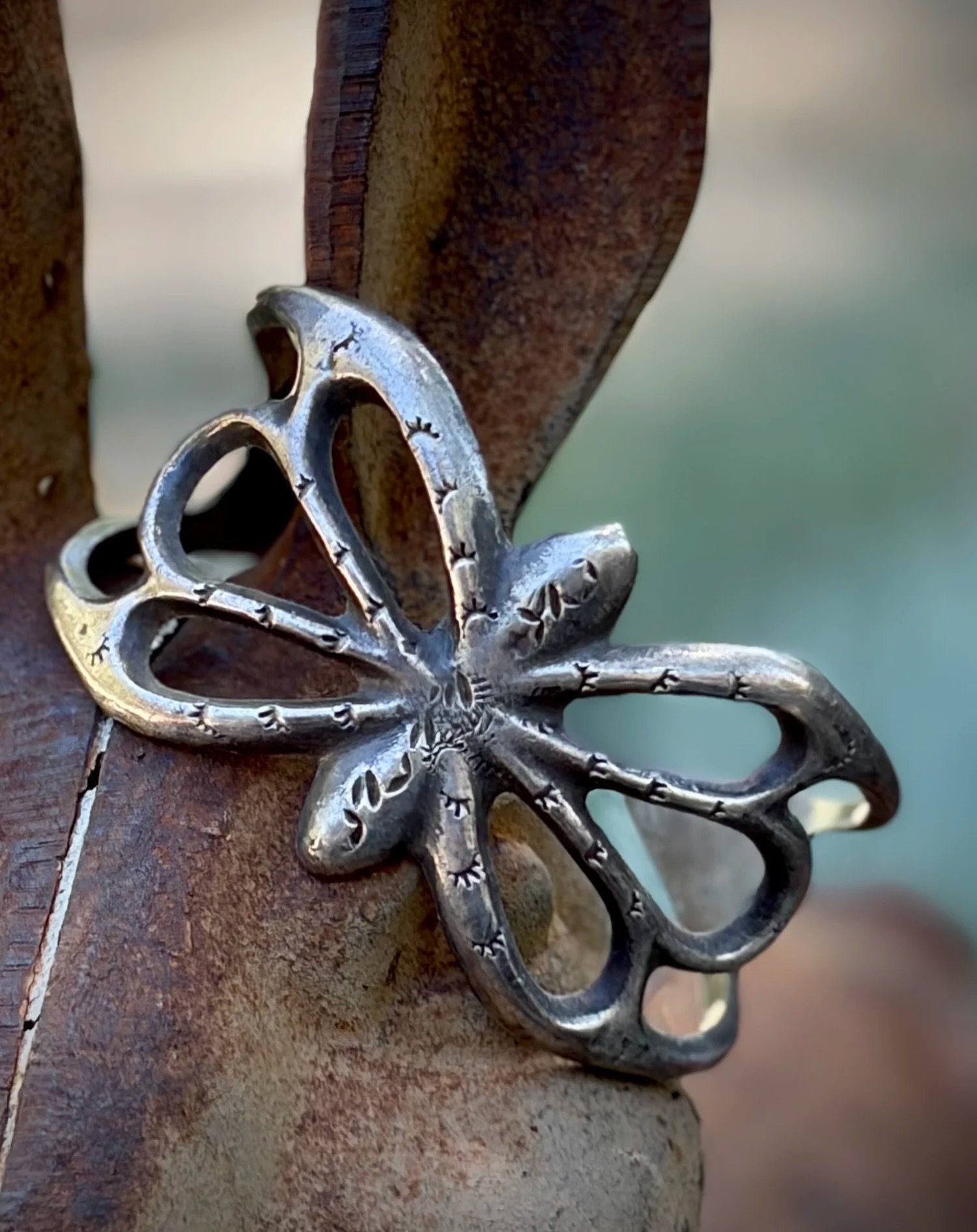 💠 Beautiful OLD PAWN Navajo Sterling Silver Butterfly sand cast bracelet 💠
Available here: https://theoldspanishtrading.com/silver-buckles-and-conchos/sandcast-butterfly 

Beautiful wide cuff Navajo sand cast bracelet in the shape of a butterfly.  