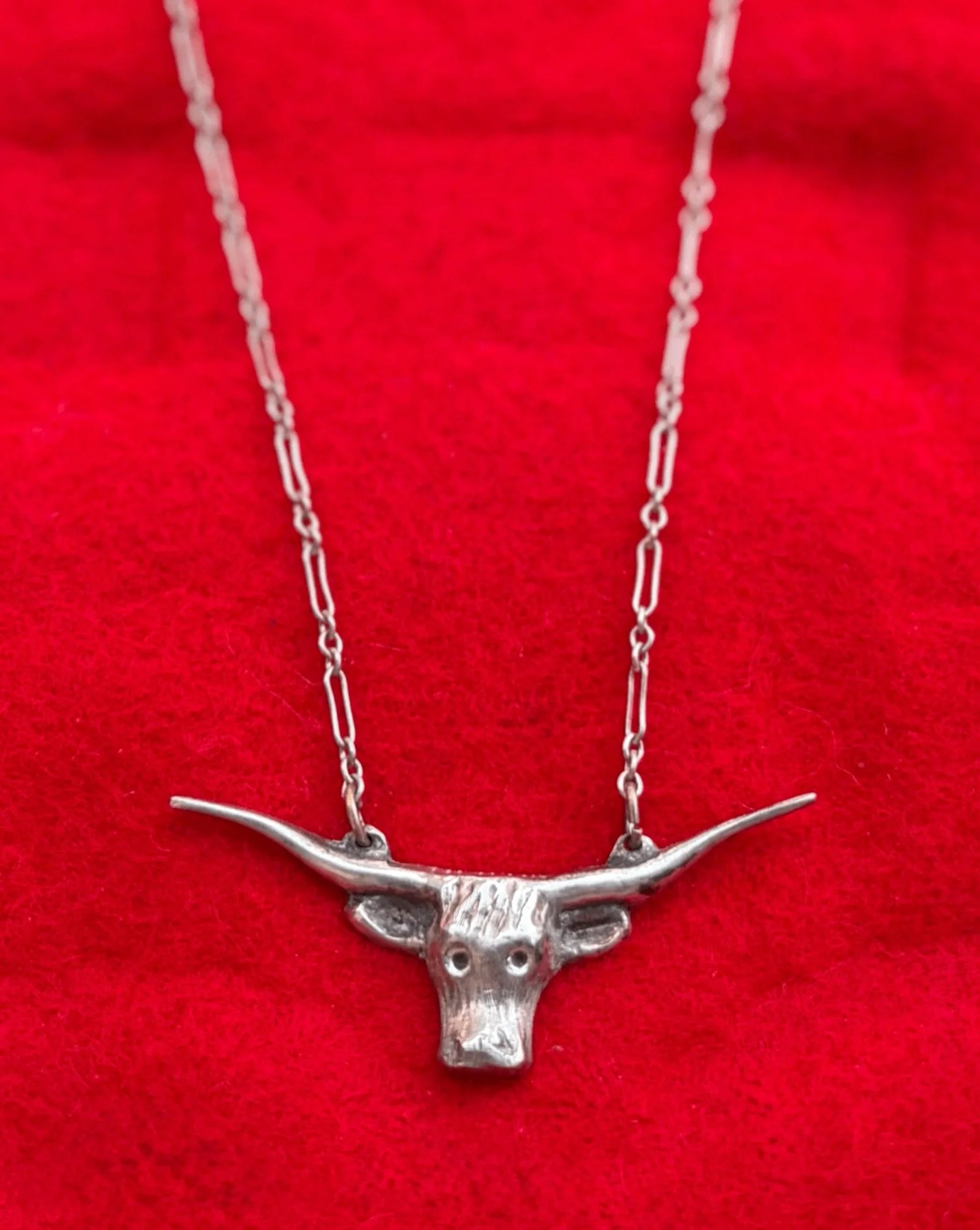✨ Antique Sterling silver longhorn necklace ✨
Available here: https://theoldspanishtrading.com/silver-buckles-and-conchos/antique-sterling-silver-longhorn-necklace 

Beautiful antique Sterling silver longhorn necklace.  The longhorn is a bar style pe
