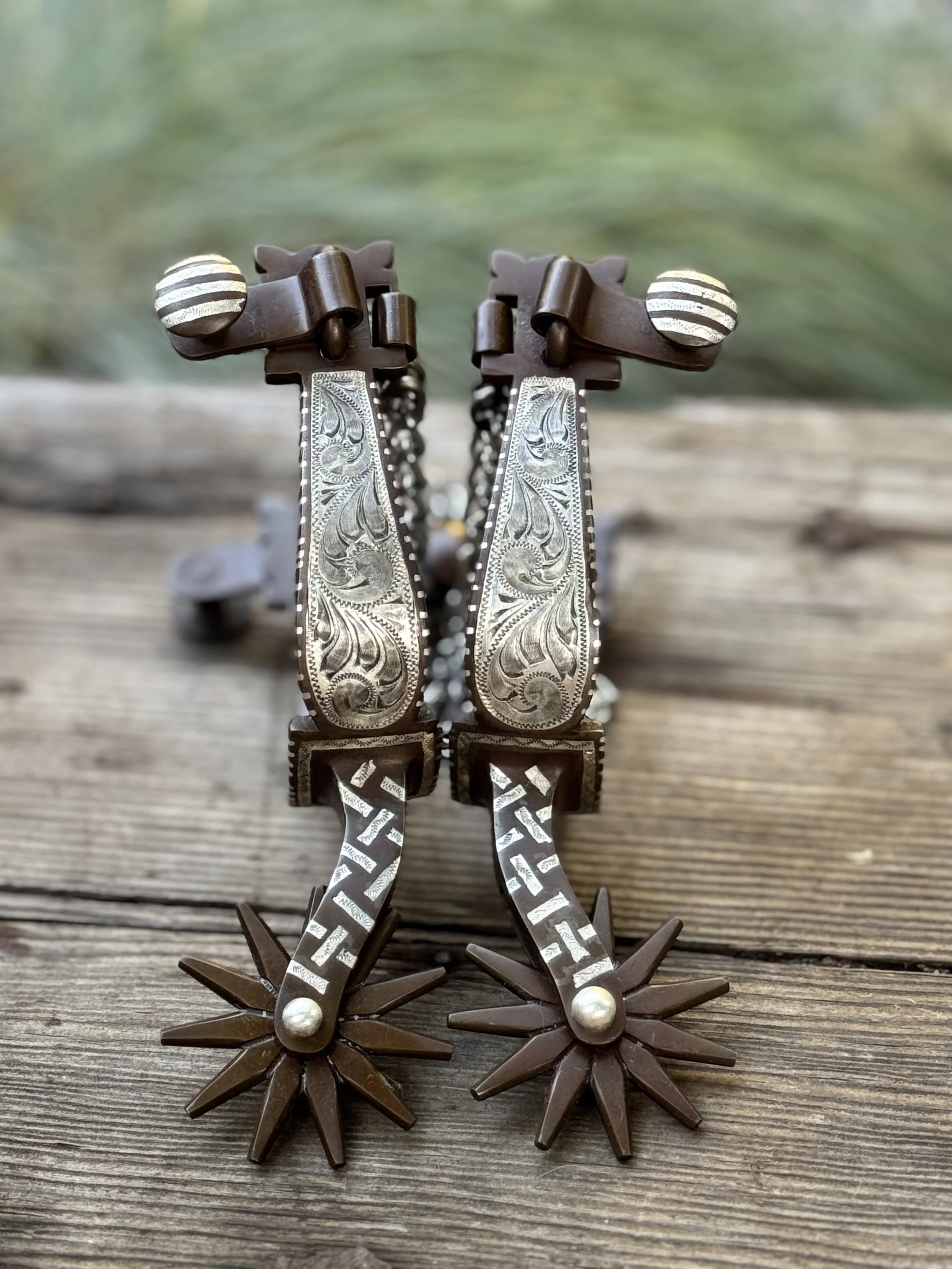 Vaquero style Gooseneck spurs with sterling silver inlay