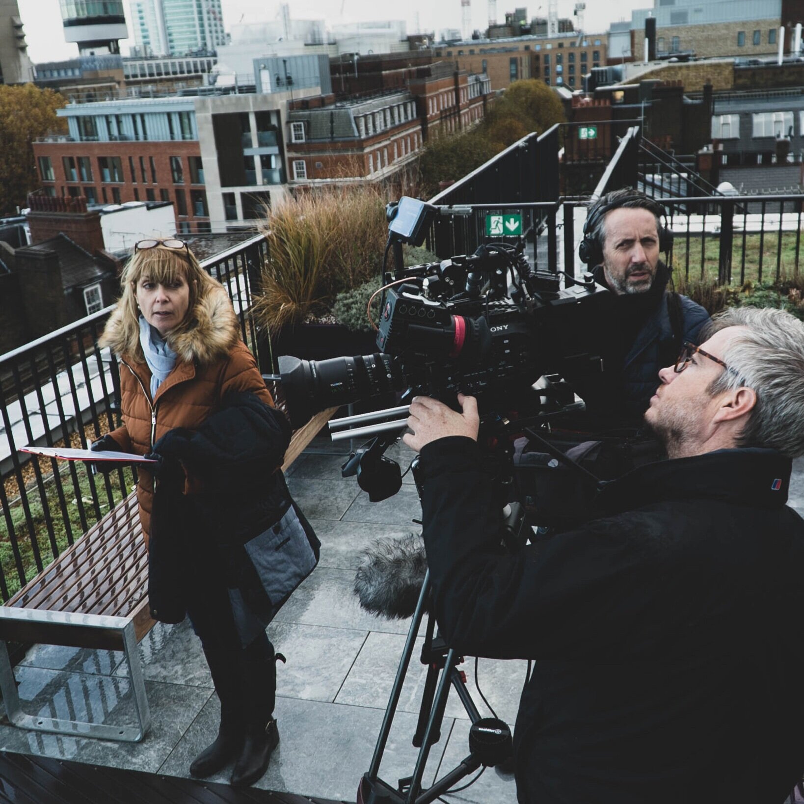 Sally+on+roof+with+crew.jpg