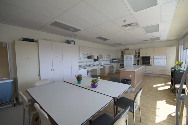 BEFORE: Existing kitchen was drab and lifeless. Lack of counter surface was ill-suited for a kitchen intented to be used by large groups.