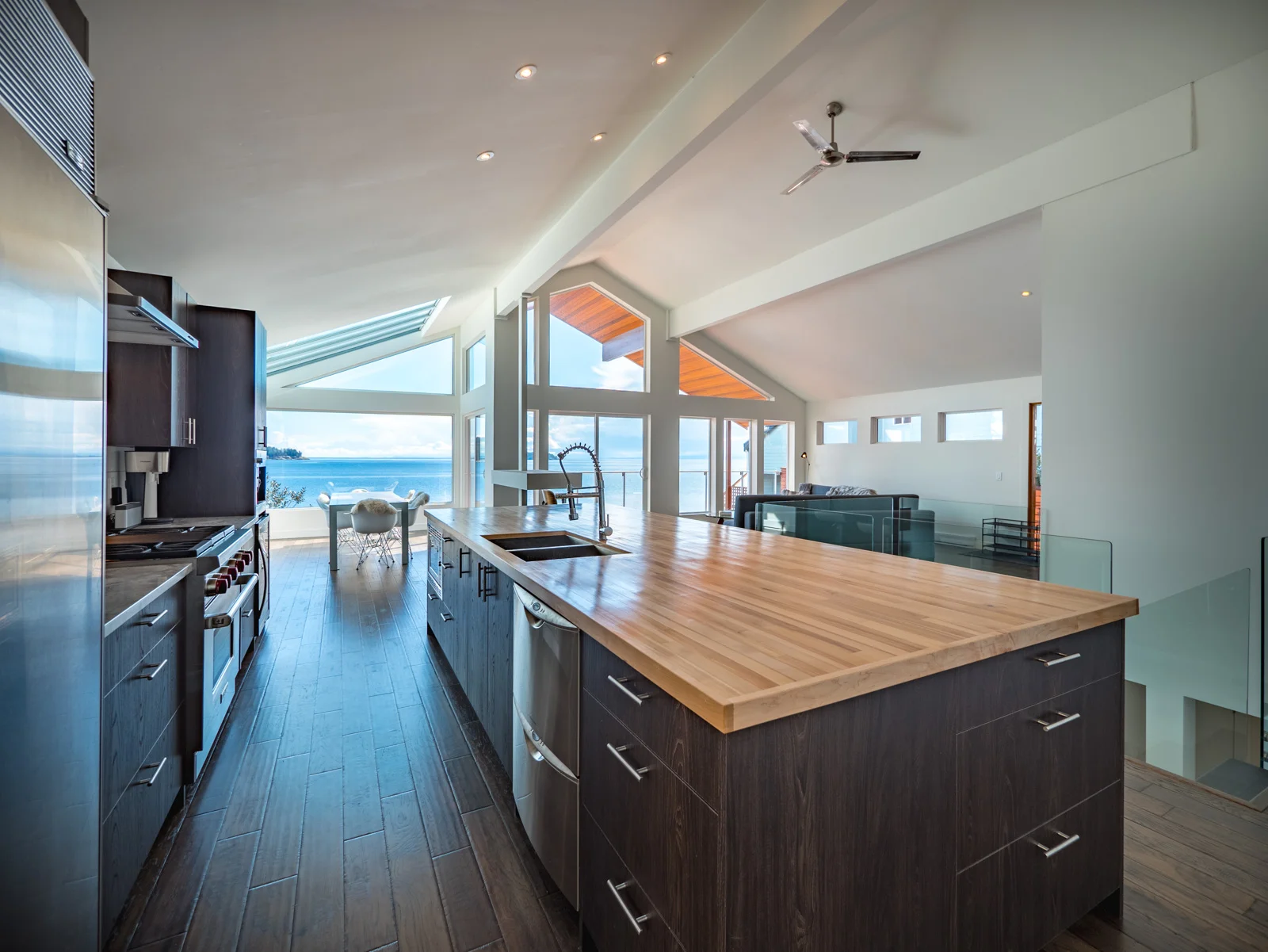 With abundance of windows, a sunlit dining room, a large chef’s kitchen and an island perfect for entertaining - this truly is a dream home for someone looking for a water-front West Coast living.