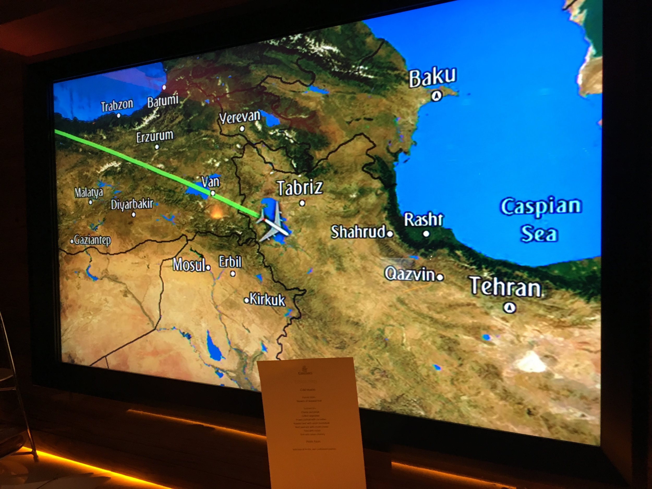 The air show on the big screen in the bar