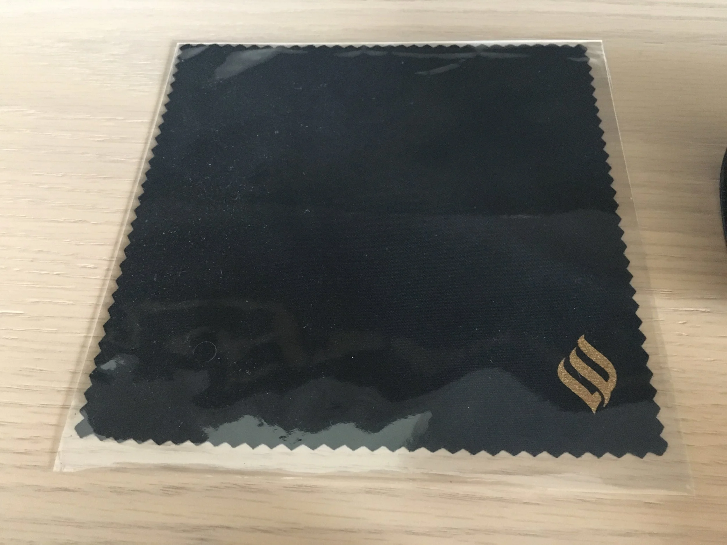 Cleaning cloth that magically appeared next to my sun glasses box - it's the details!