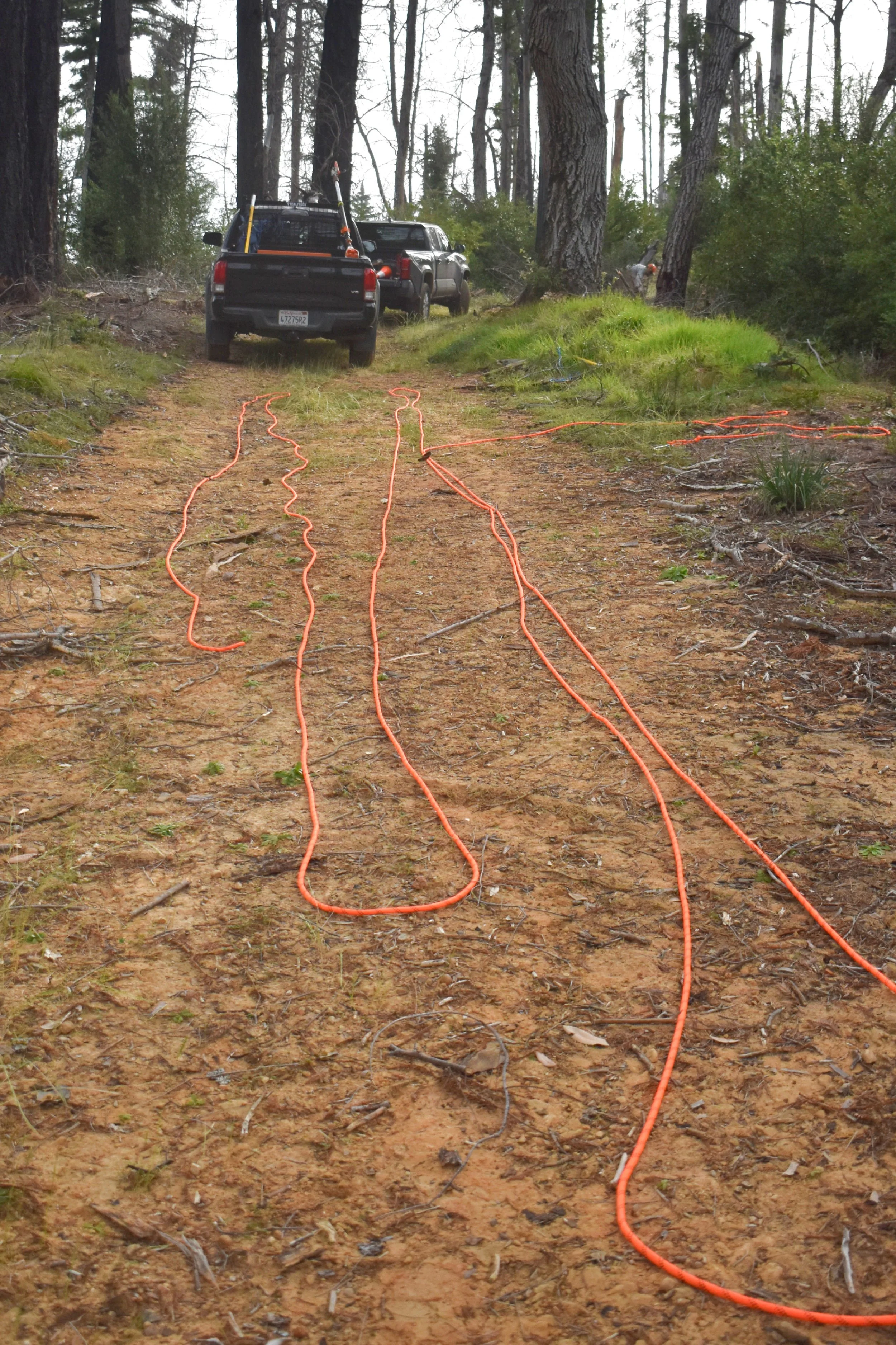 Laying Out Drag Line Rope on Fire Rd.jpg