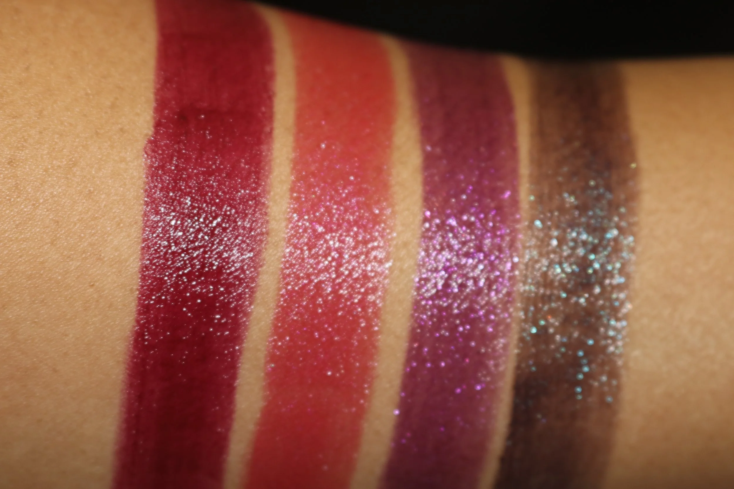 Swatches L to R: 450 Orchid Infinity (creme), 460 Ripped Raisin (shimmer pearl), 480 Nova Noir (cooled chrome), 470 Moon Rock (cooled chrome)