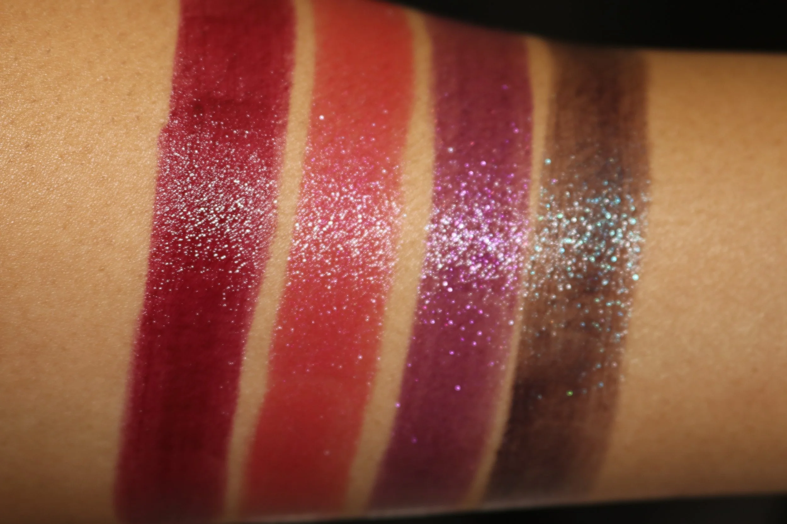 Swatches L to R: 450 Orchid Infinity (creme), 460 Ripped Raisin (shimmer pearl), 480 Nova Noir (cooled chrome), 470 Moon Rock (cooled chrome)
