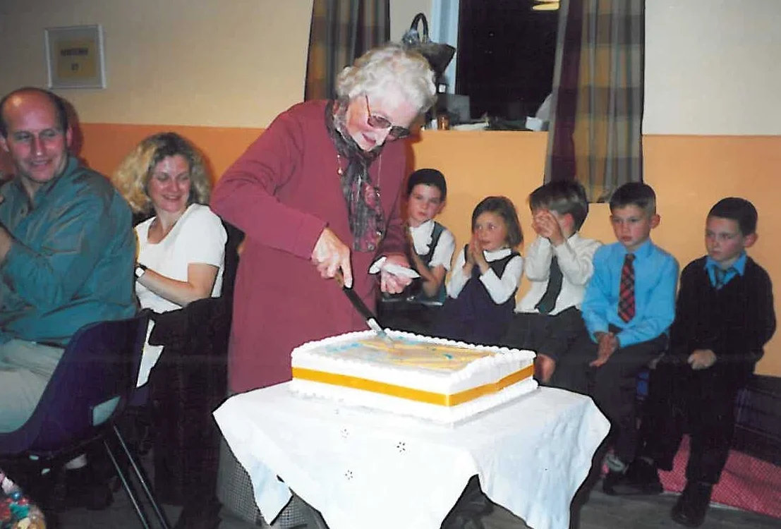The honour of cutting the birthday cake fell on Mrs Beaton Senior