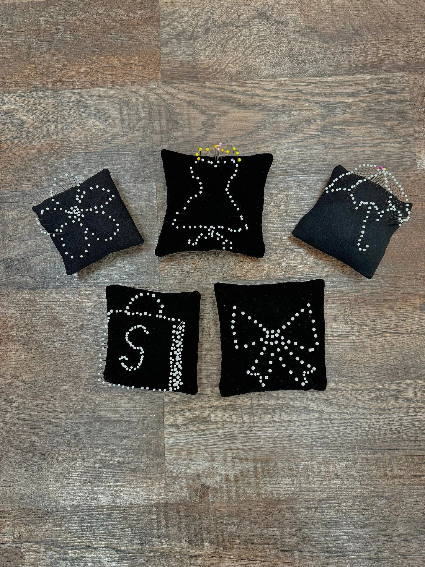 Pin Cushion Competition 📍 
With our alterations department in full swing (prom and weddings, here we come 🫶) we are going through TONS of pins! This week we decided to have a little competition - let us know which cushion has your favorite design!
