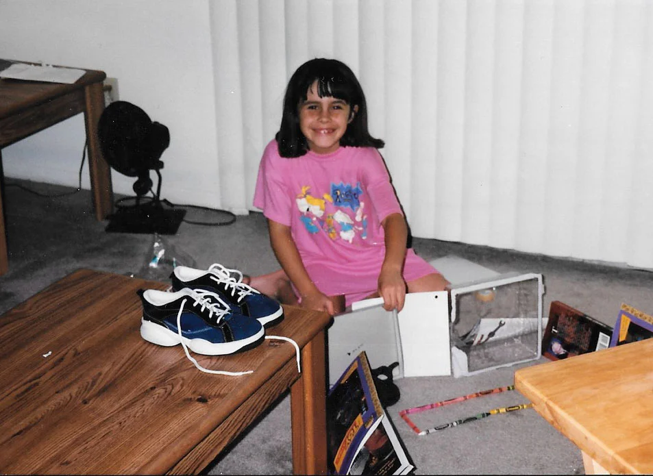 Little goofy Meg. I love this photo not because of the awesome Rugrats jammies (ha!), but because it's of me using my imagination when I was younger. I used to want to be a "house designer" and would create these made-up houses with just about anything I could find (as you can see, the books and crayons). I would get graph paper and colored pencils and design my dream home with couches and basements with pools. It's neat to look back at this.