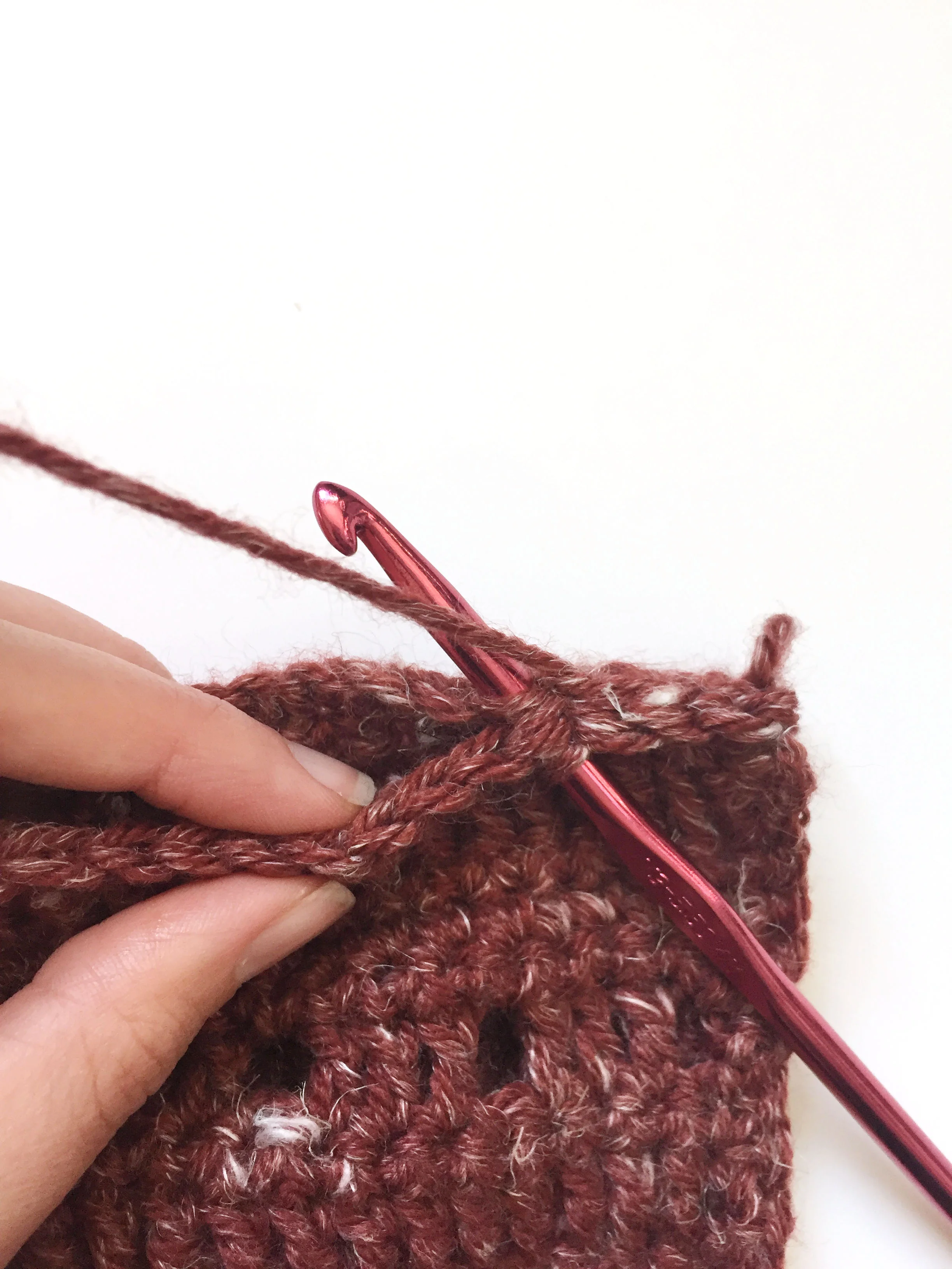 Above is what it looks like as you slip stitch across the two short sides to connect them. You are sl st'ing row 1 to row 53.