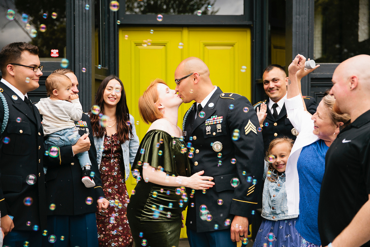 Military couple kissing 