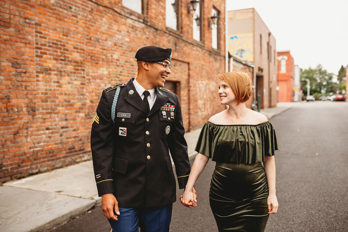 Couple holding hands near Fireman's park