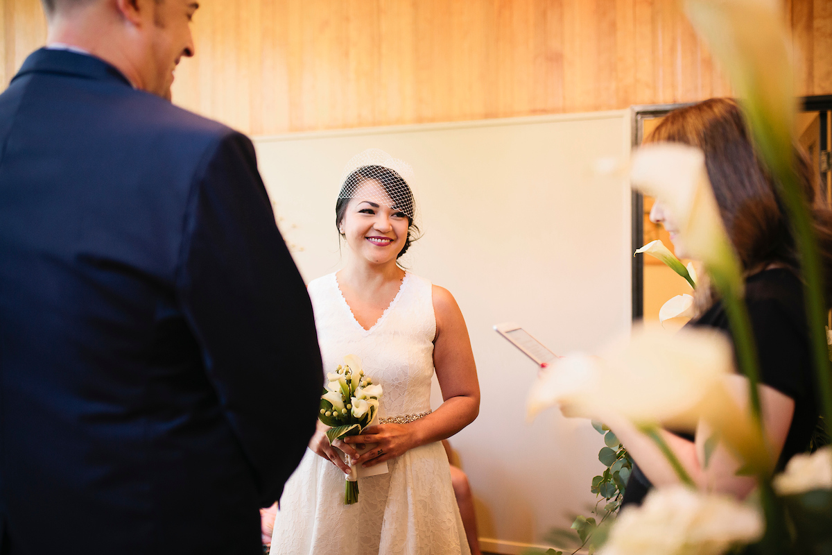 Bride smiling with flowers