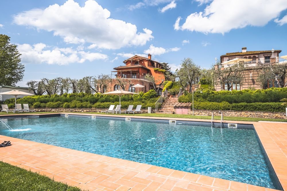 Swimming pool with terracotta paver deck