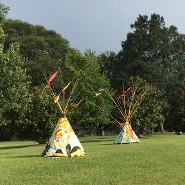 #CosmicTipi (2016) and #ManySelvesTipi (2016) Each ~15'x8'x8' · bamboo, oil paint on canvas, rope, canvas, wood, RIT Dye, spar varnish