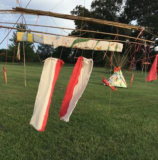 #KarmaTipi - Par Flèche Instantiation - Freedom Park ATL 2015 · bamboo, oil paint on canvas, rope, found wood, RIT Dye, spar varnish · ~8' x 14'