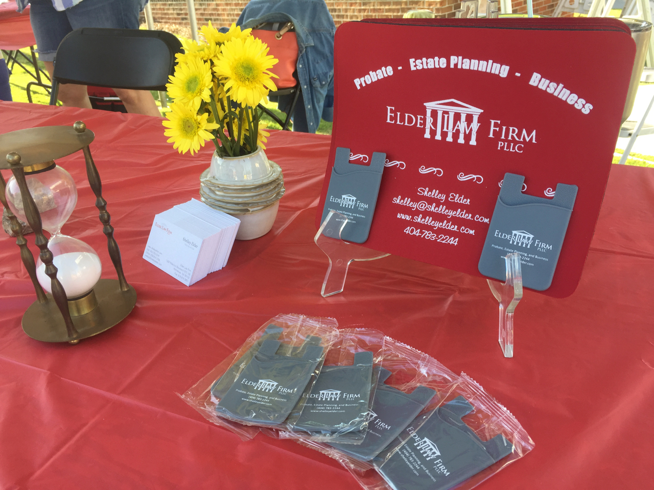 Shelley offered iphone 'wallets,' mouse pads and fact sheets as well as candy for the kids.