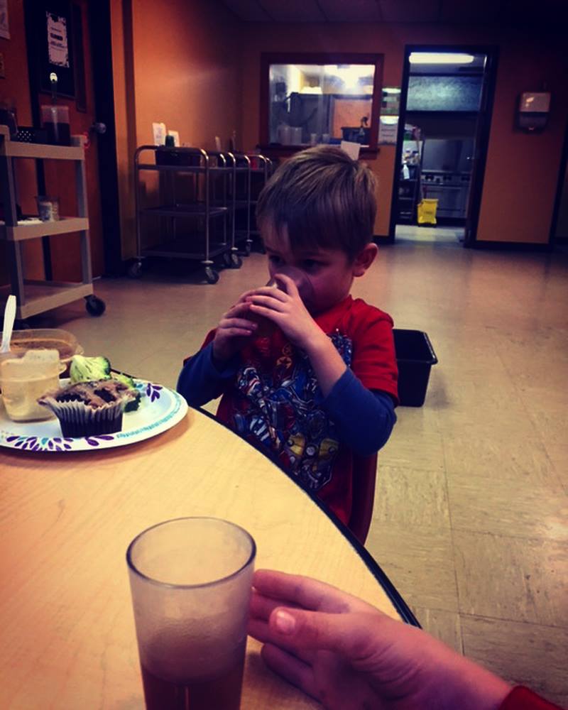 kid drinking farther away - daycare.jpg
