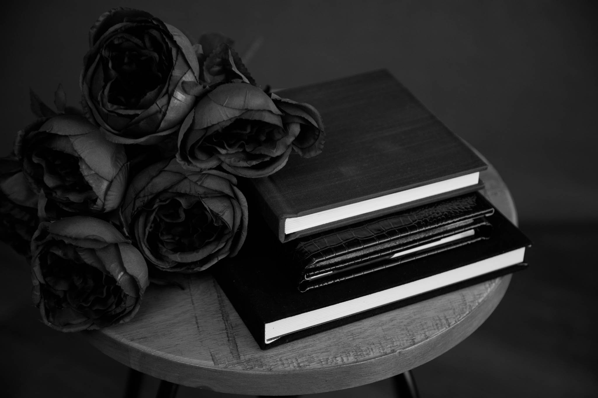 Digital photos are absolutely amazing and so convenient to share, but printed portraits... Next level. 
I offer prints with every portrait and boudoir session.  Albums are my current favorite, but there are lots of options and I'll help you choose a 