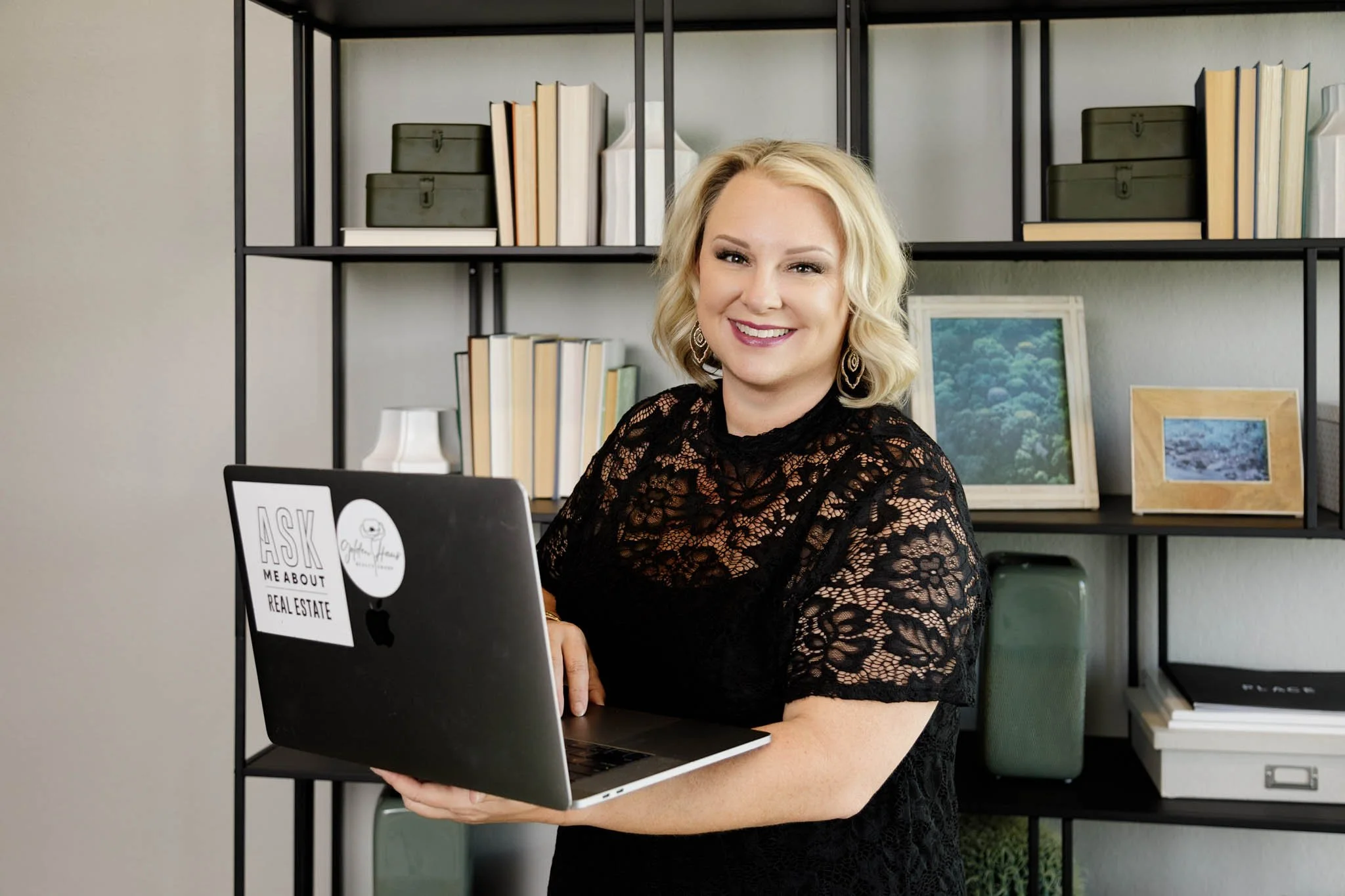 branding photo of woman smiling holding laptop looking at camera on location new Braunfels tx and Schertz Texas photographer / Photo by Erin Valkner Photography of New Braunfels, Texas. See more at www.erinvalknerphotography.com/blog