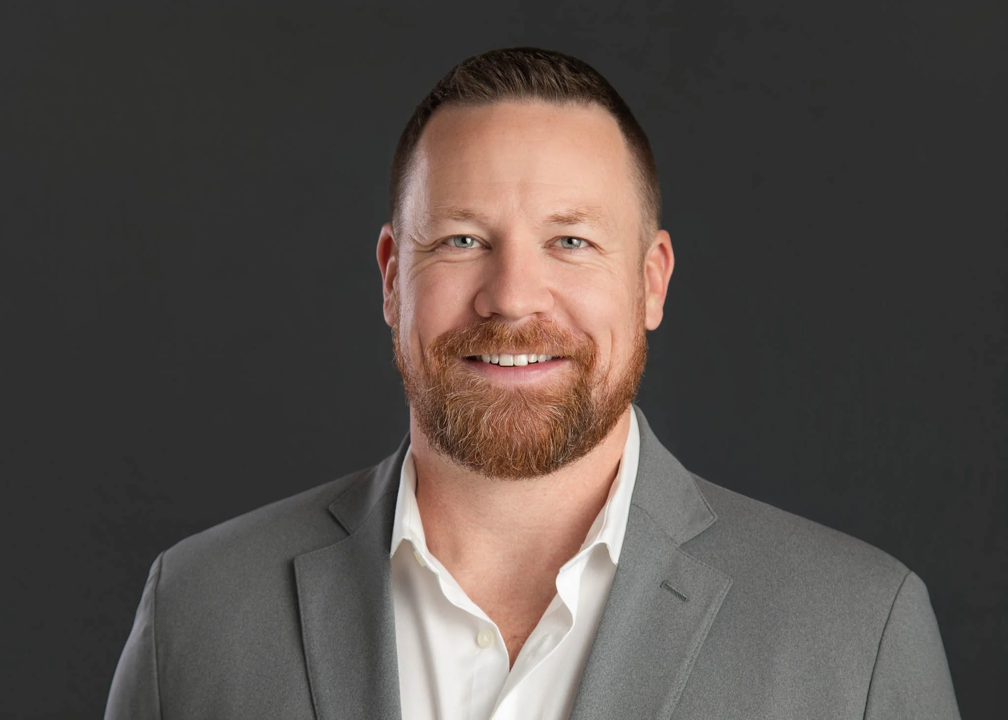 professional headshot man in grey suit new braunfels studio by erin valkner photography