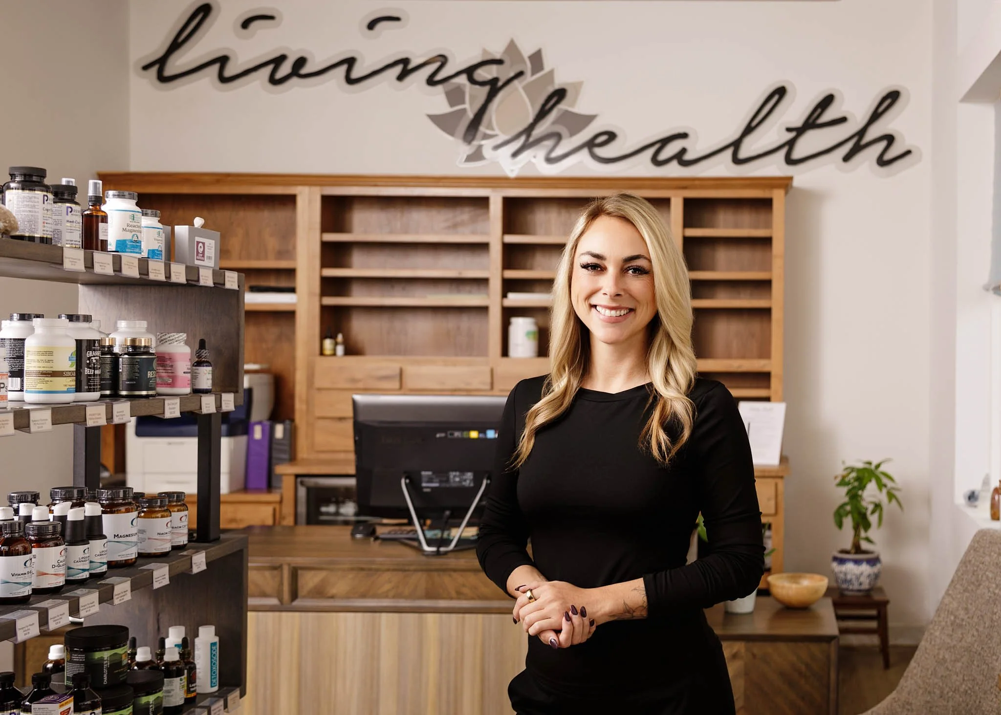 Owner of Healthy Living Holistic, Jessica Cohn, in the business interior located in New Braunfels, Texas /  Photo by Erin Valkner Photography of New Braunfels, Texas. See more at www.erinvalknerphotography.com/blog