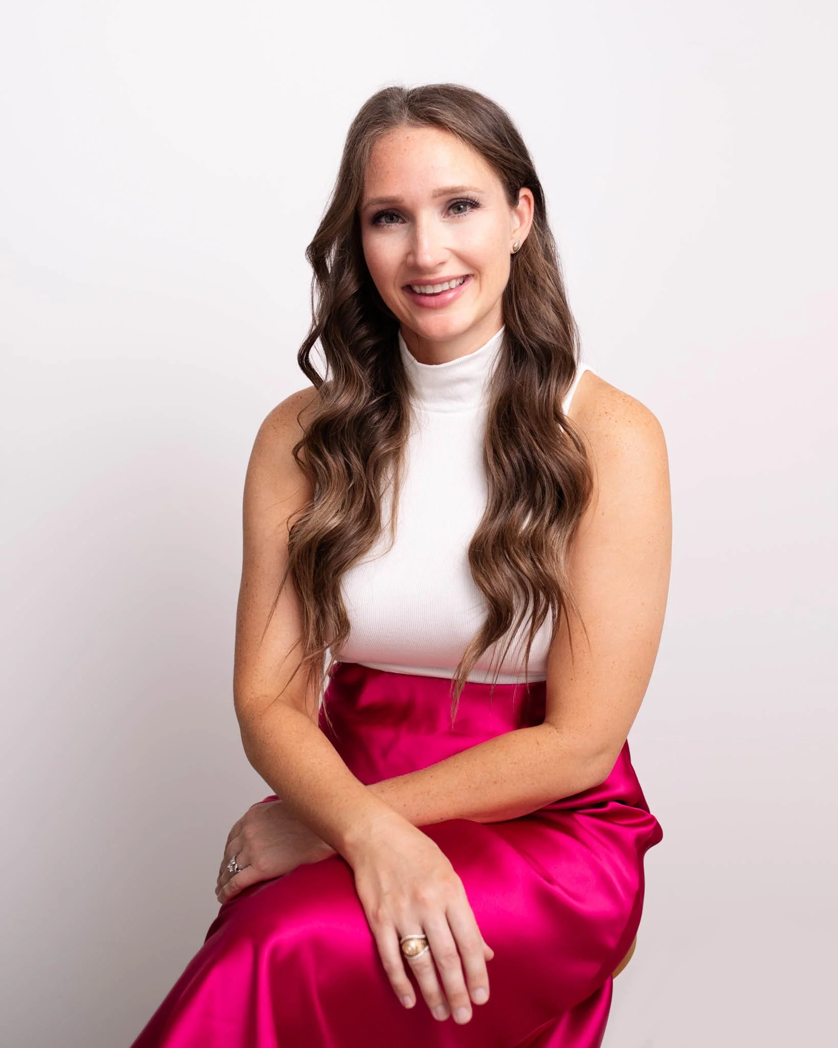 Branding photo of smiling woman seated with confident expression / Photo by Erin Valkner Photography of New Braunfels, Texas. See more at www.erinvalknerphotography.com/blog
