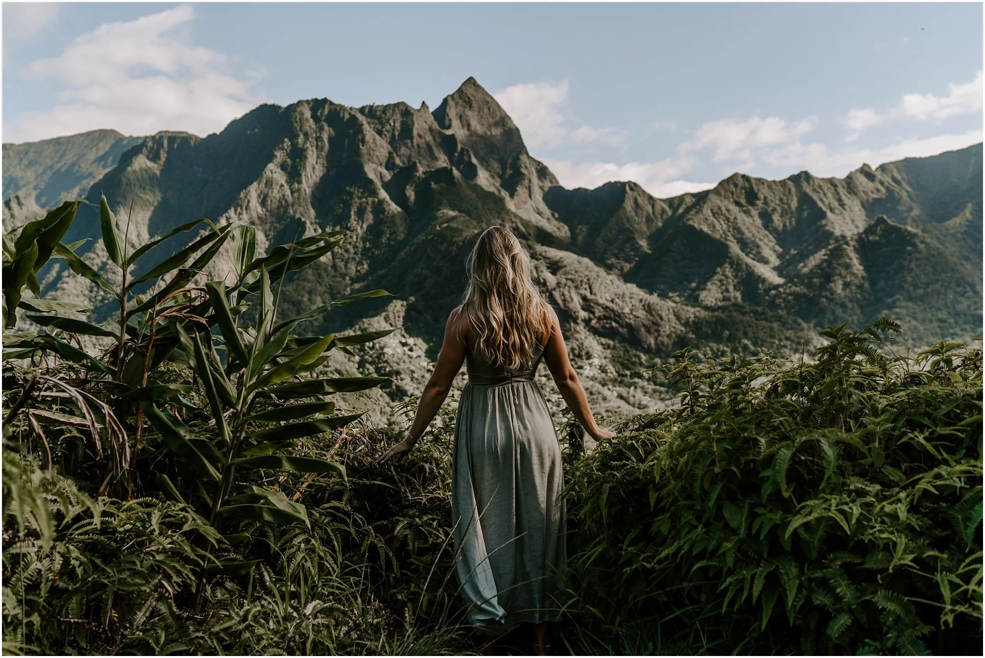 girl-facing-valleys-maui-hawaii.jpg