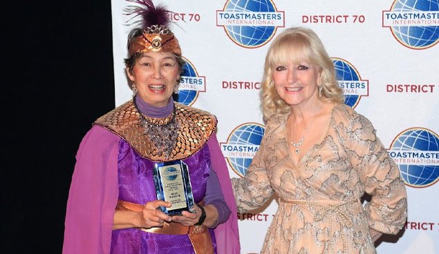 PR-Award-Best-Website-Oatley-RLS-Toastmasters---Rebecca-Ruiz-accepting.jpg