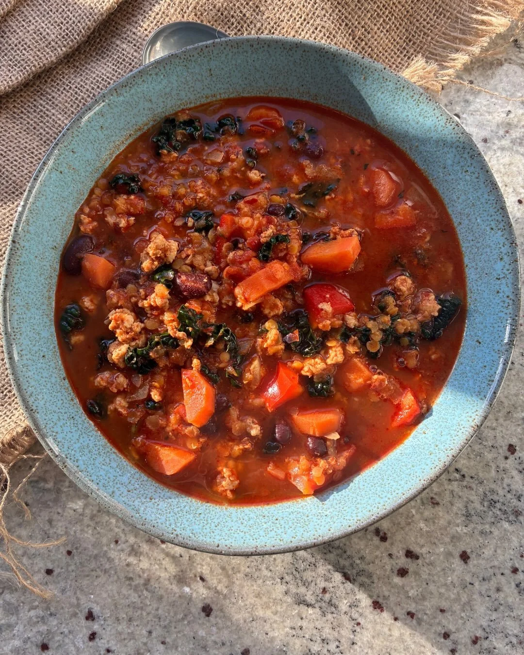 A delicious high protein and high fibre bowl of comfort.⁣
⁣
This 𝗛𝗲𝗮𝗿𝘁𝘆 𝗧𝘂𝗿𝗸𝗲𝘆 𝗠𝗶𝗻𝗰𝗲, 𝗟𝗲𝗻𝘁𝗶𝗹 𝗮𝗻𝗱 𝗕𝗲𝗮𝗻 𝗦𝗼𝘂𝗽 is packed with lentils, beans and plenty of veggies &ndash; perfect for batch cooking - I have several portio