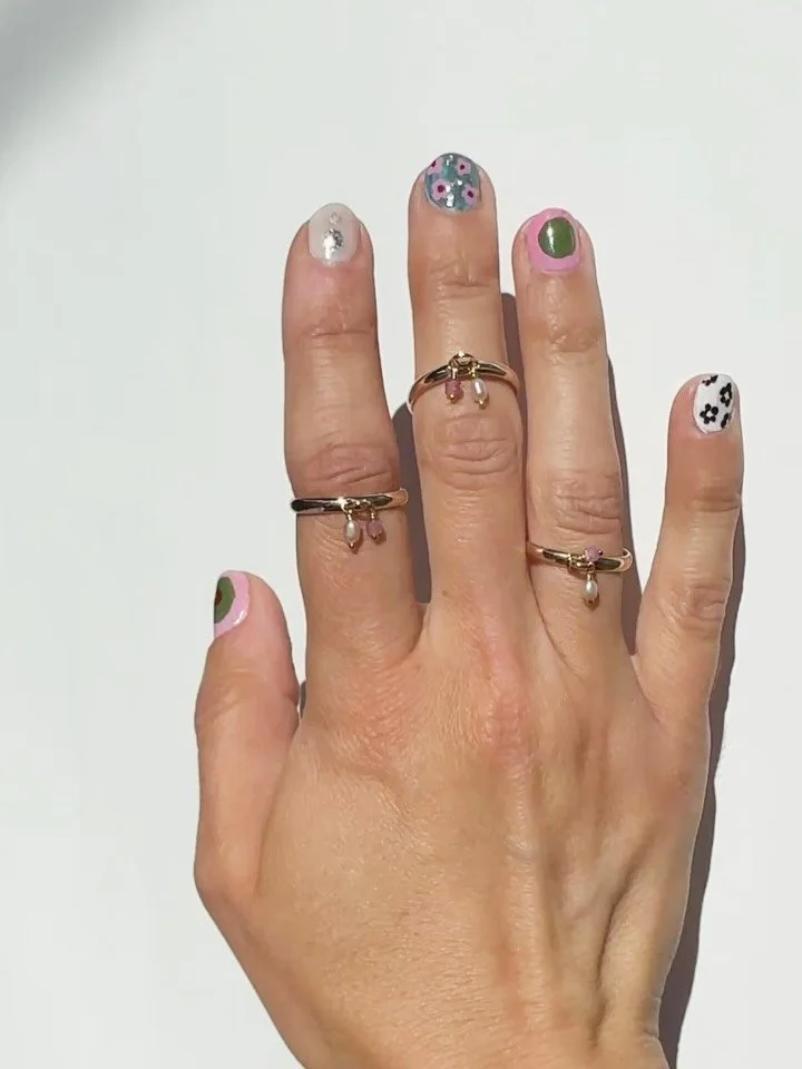 My favorite new rings if you like charms &amp; swish fish. Shop the Raw Stone Dangle Ring + Sardine Ring for the perfect match.