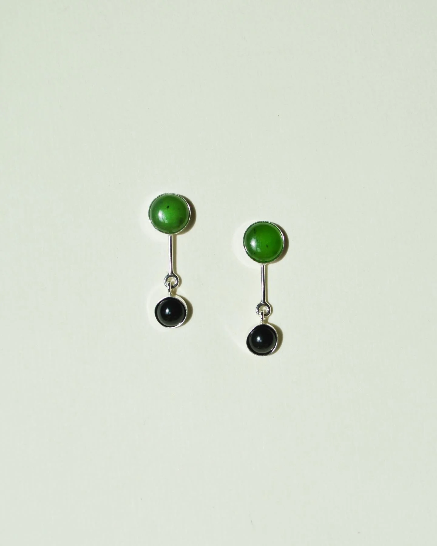 Jade + Onyx is a match made in heaven. New Jade Onyx Dangles - made with solid sterling silver, Nephrite Jade &amp; Natural Onyx. 

#jadeearrings #onyxearrings #onyxjewelry #silverjewellery #sterlingsilver #madeincolorado