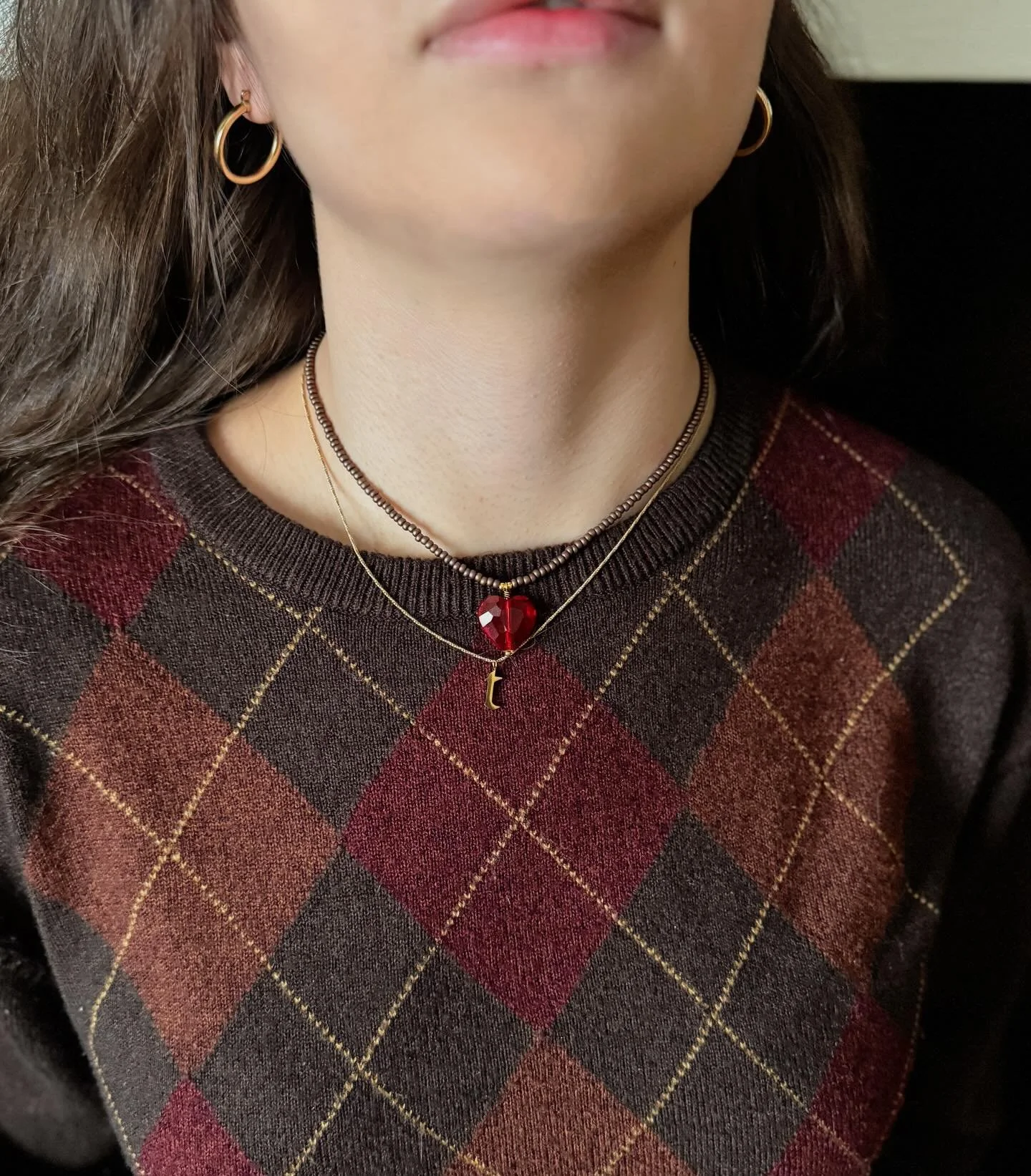 My daughter stacking the Cocoa Heart Necklace with her &ldquo;t for Taylor&rdquo; Initial Necklace. 🤌🏼 💋