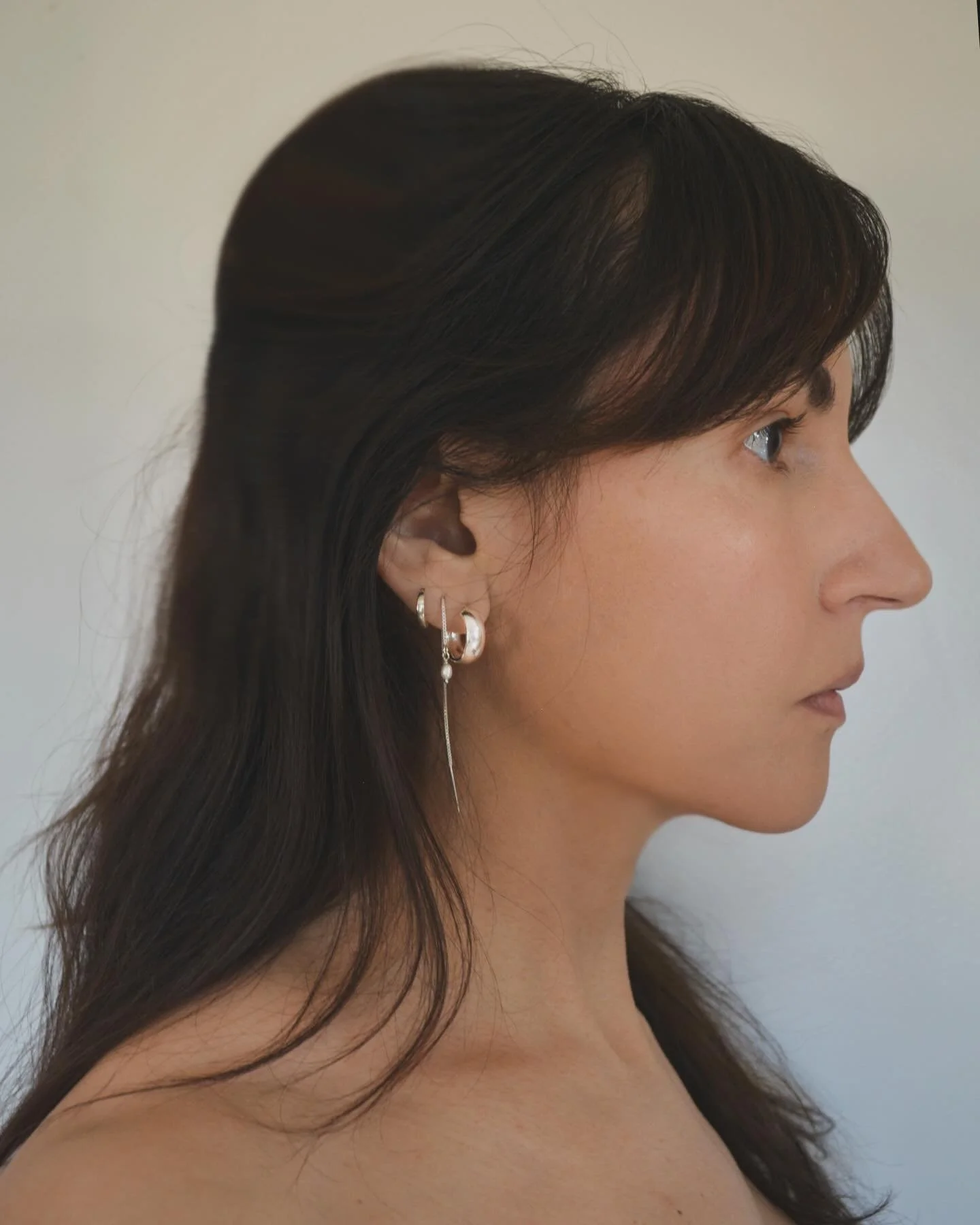 Silver layered hoops + new Mini Pearl threaders. 

Link to shop in bio.