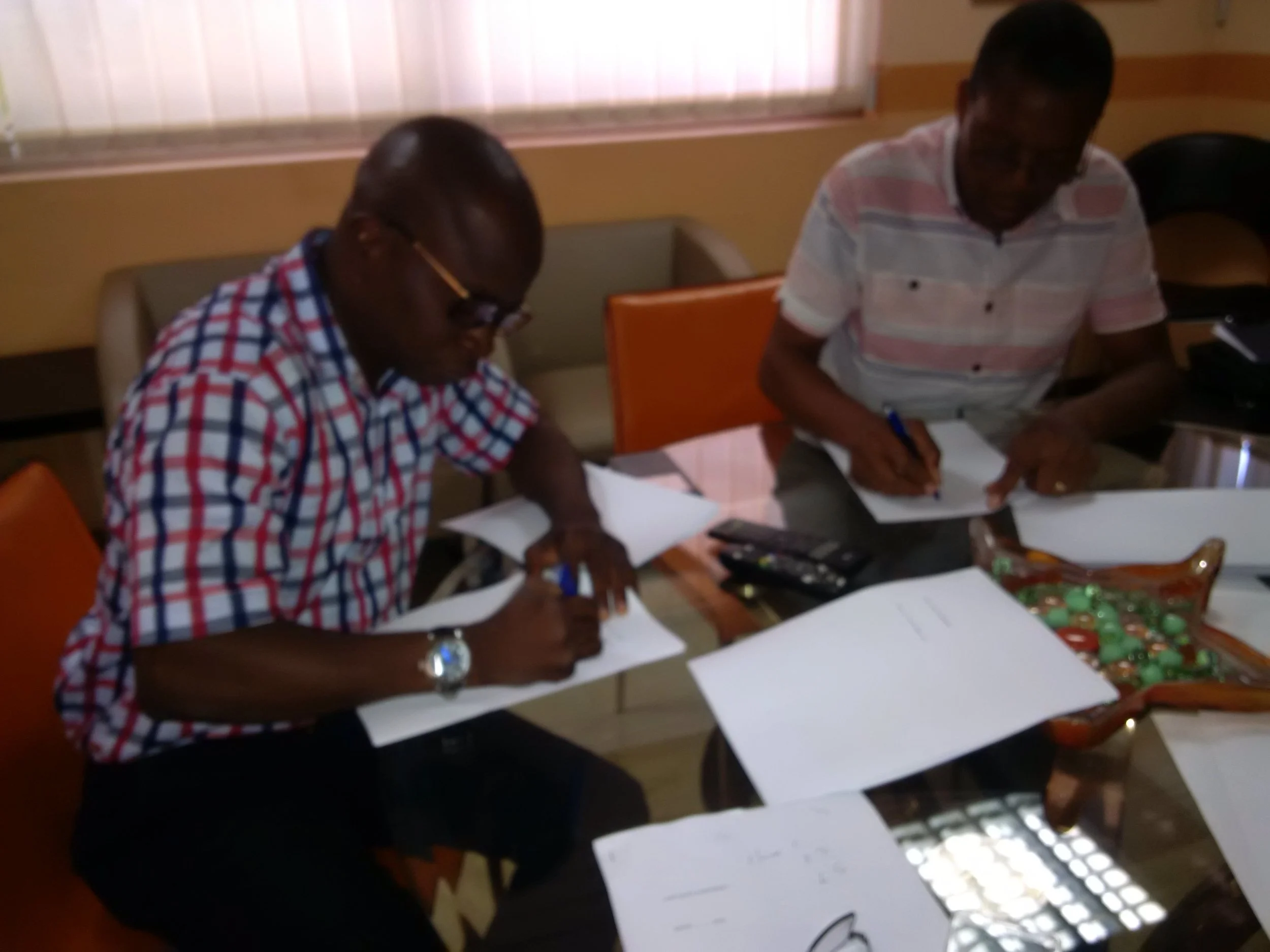 Deji Signing the Land Lease agreement on Behalf of Ada Solar Ltd.