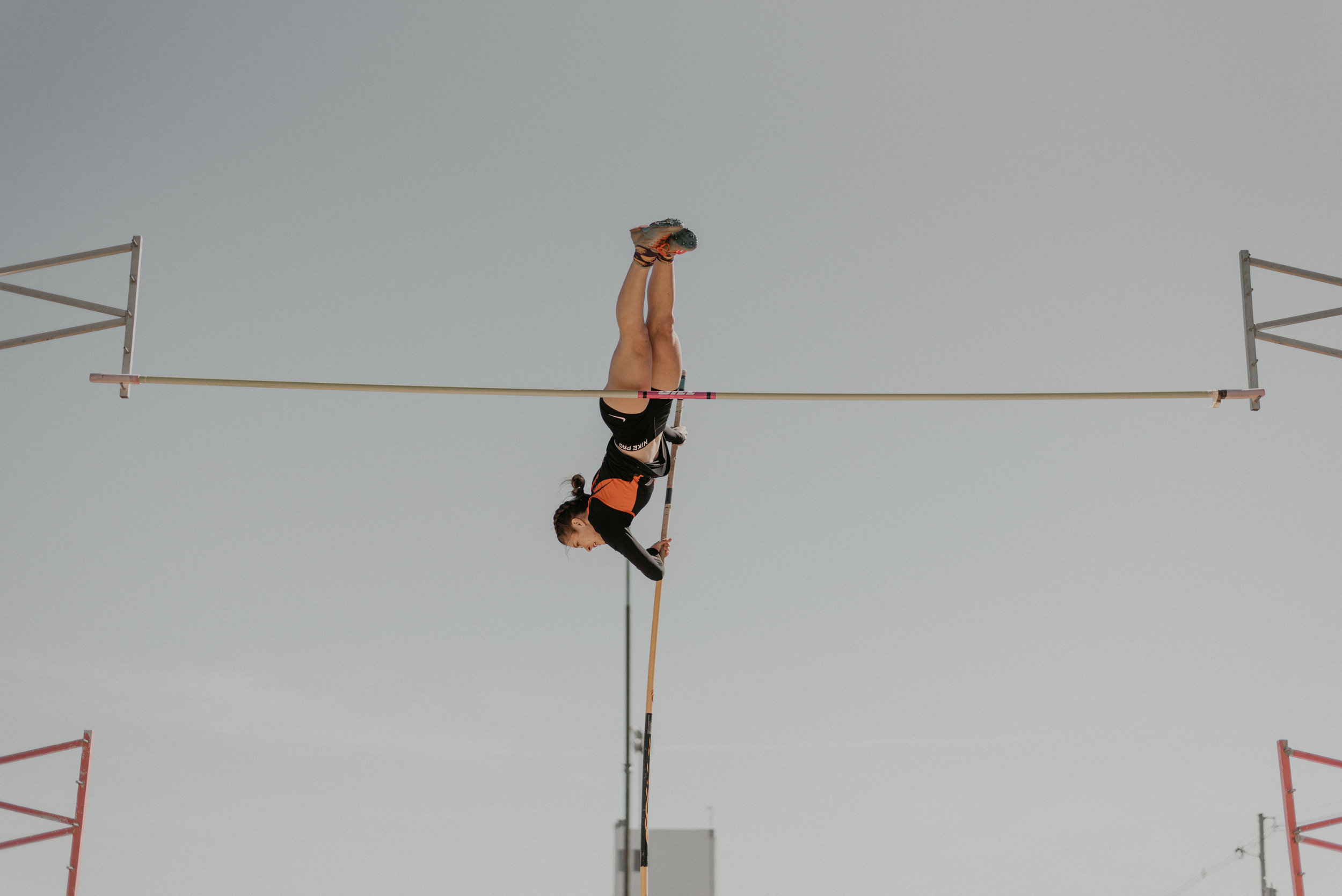 Track and field athletes from around the area descended on Lindsborg Friday to compete in the the Smoky Valley Invitational held on the campus of Bethany College. Our photo feature by Gracie Lott is a glimpse at some of the competition centered on classic events from running, jumping and throwing. Smoky Valley’s Belle Peters goes toes up to come down with a first place finish in the pole vault, clearing the bar at 11’ 6” for the win.