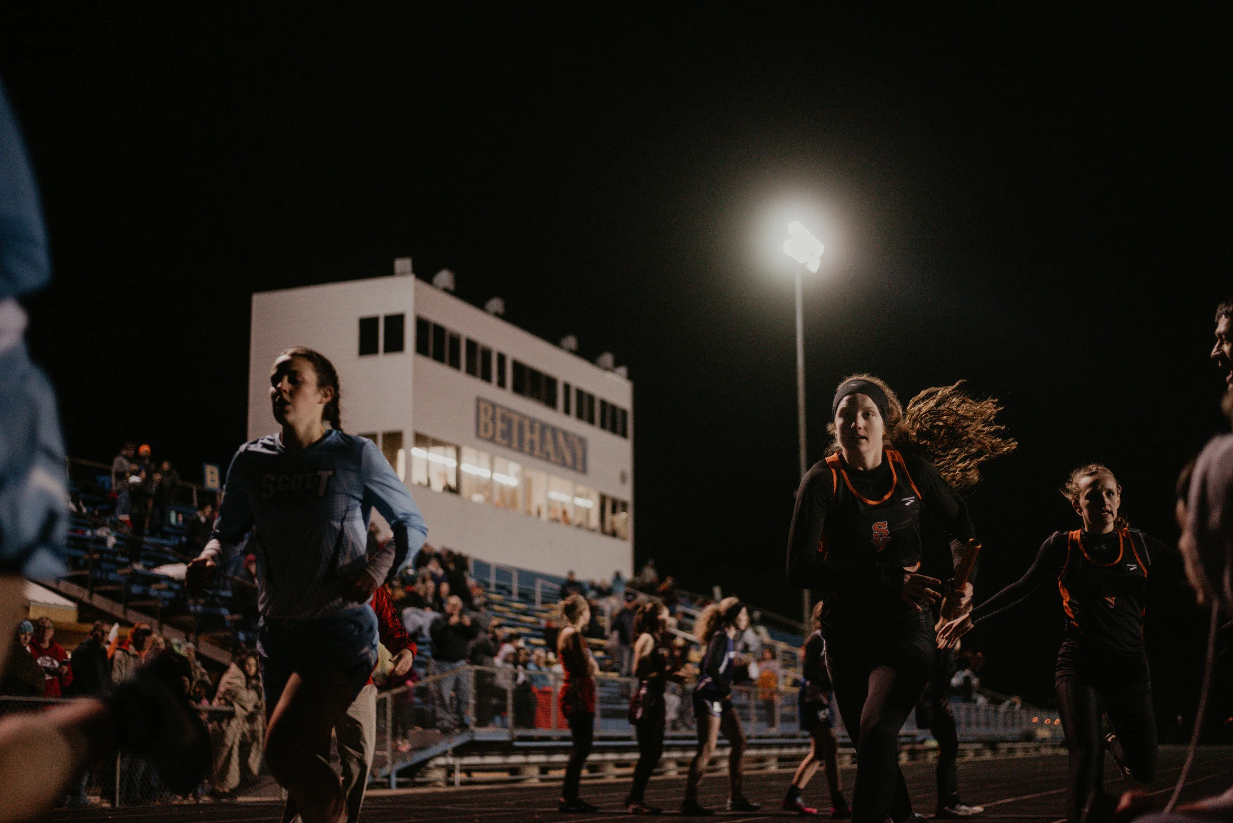 Relay handoff: Smoky Valley Girls | 4x400m | Savannah Phillips to Abby Rose | 4:21.12 | 2nd Place