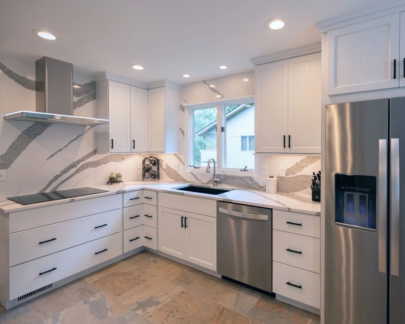 Swipe to see this incredible before and after! 👉⁠
⁠
This North Asheville condo kitchen went from traditional and dark to transitional and chic with one smart move: removing the peninsula and letting the space breathe. ⁠
⁠
Working with HomeSource Des